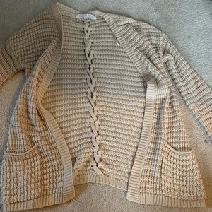 Tan cardigan with braid detail on back